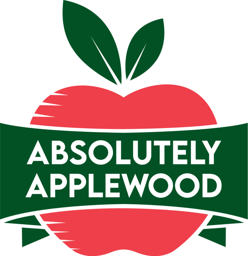 Absolutely Applewood logo, a red apple with a banner across it that says "Absolutely Applewood"