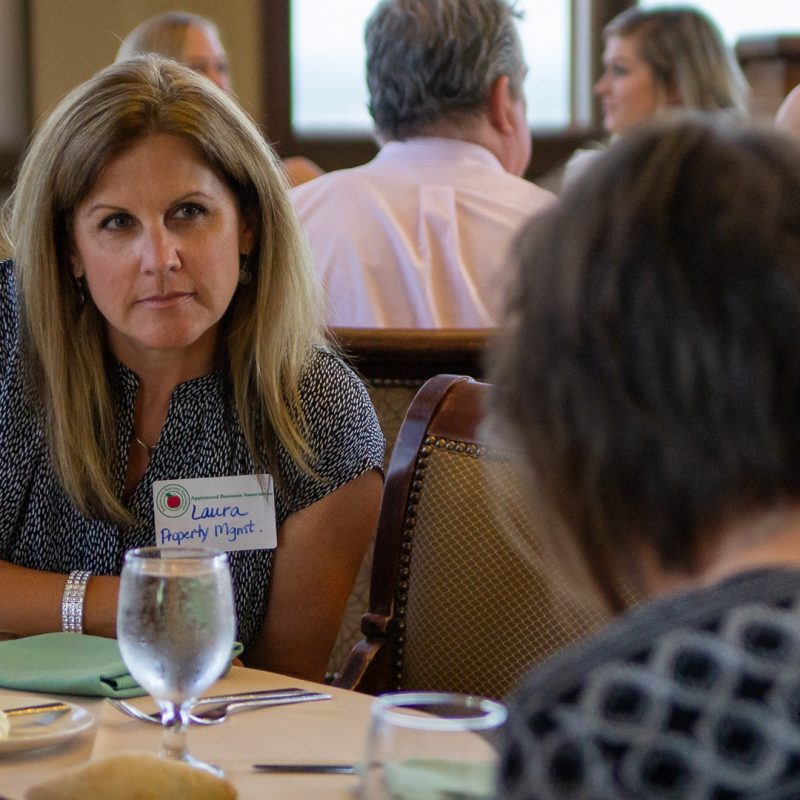 ABA member intently listening to another